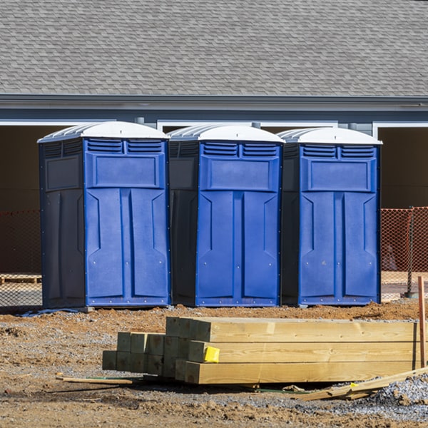 what is the cost difference between standard and deluxe portable restroom rentals in Boaz